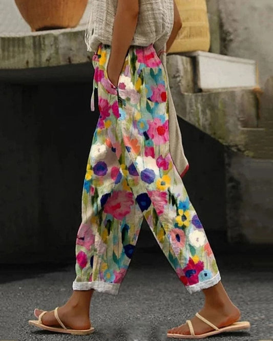 Pantalones de chándal con bolsillos y colorido estampado floral