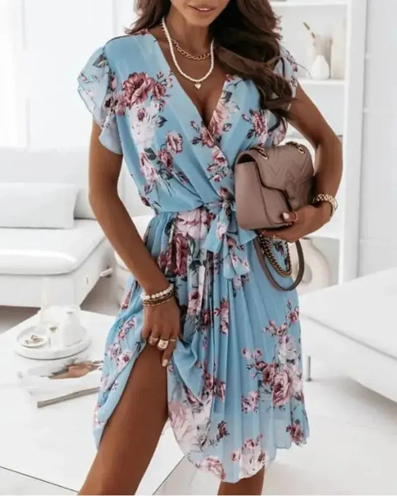 Vestido plisado con estampado floral y cinturón
