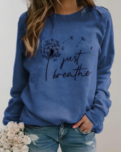 Sara | Jersey oversize de cuello redondo con inscripción "Just Breath