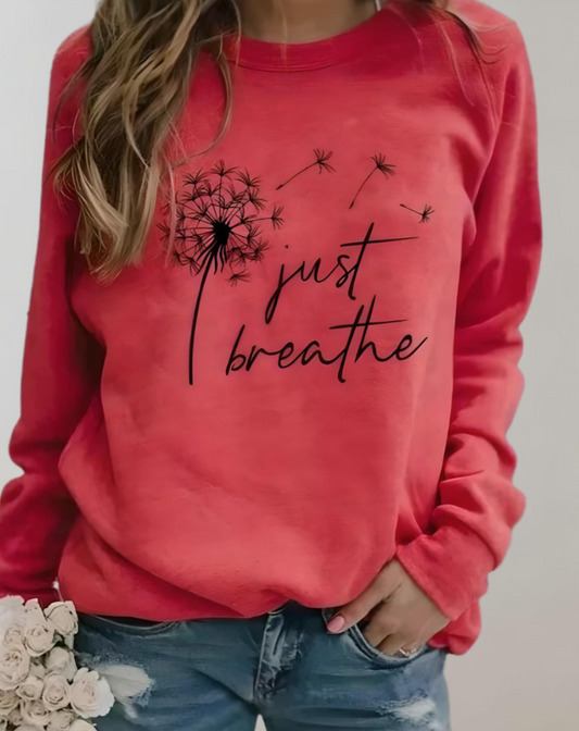 Sara | Jersey oversize de cuello redondo con inscripción "Just Breath