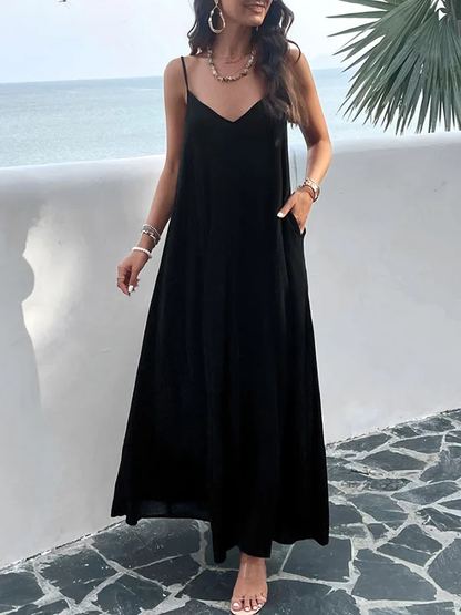 Vestidos largos lisos plisados sin mangas con abertura en el cuello y tirantes finos.