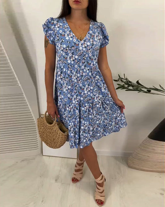 Vestido midi con cuello en V y estampado floral sin mangas