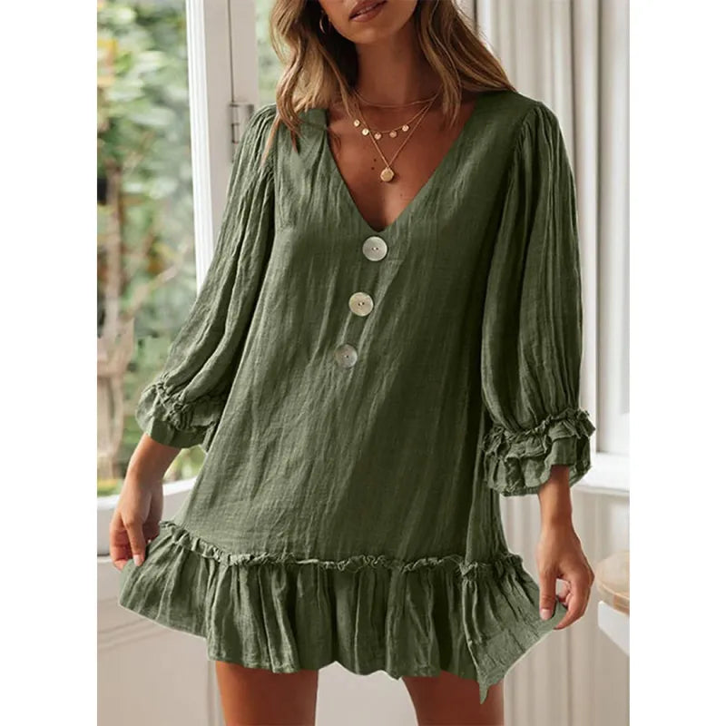 Vestido casual con mangas acampanadas, cuello en V y flecos