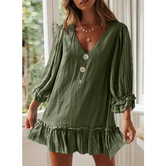 Vestido casual con mangas acampanadas, cuello en V y flecos