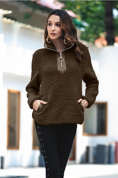 Jersey de mujer con cuello doblado y cremallera frontal