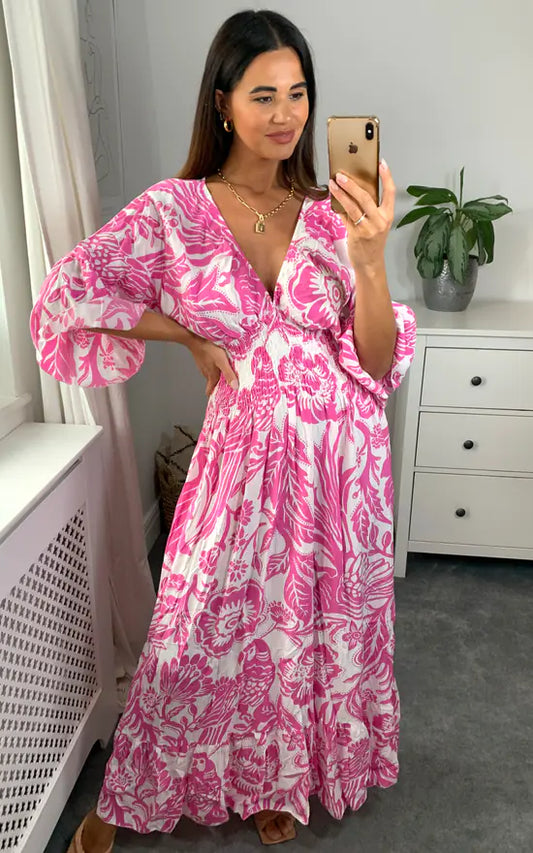 Vestido largo con escote en V y estampado floral en azul y blanco