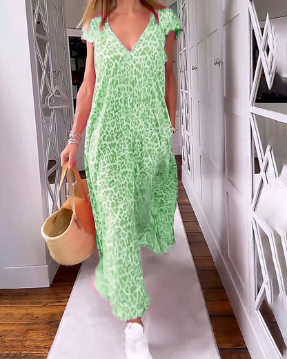 Vestido de verano colorido con cuello en V y mangas cortas