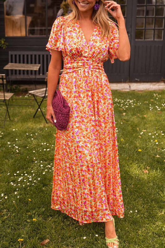 Elegante vestido largo con estampado floral y diseño fluido