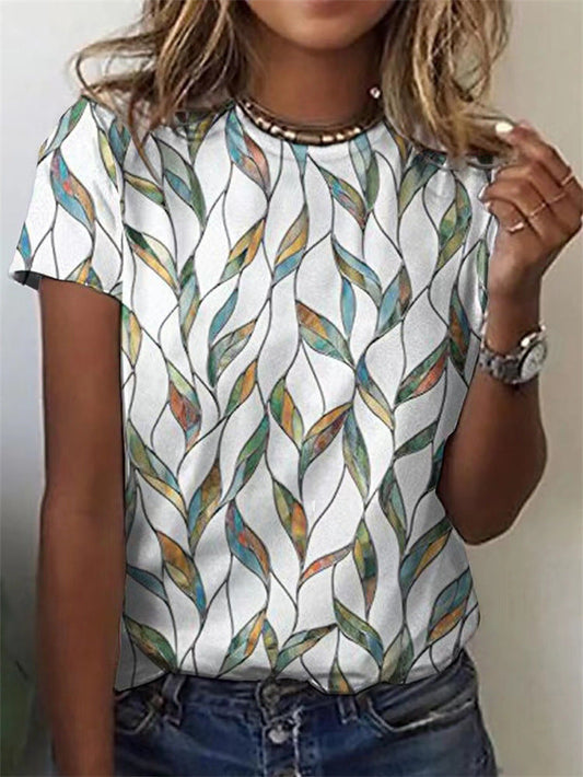 Camiseta oversize recta de manga corta con estampado de hojas y cuello redondo