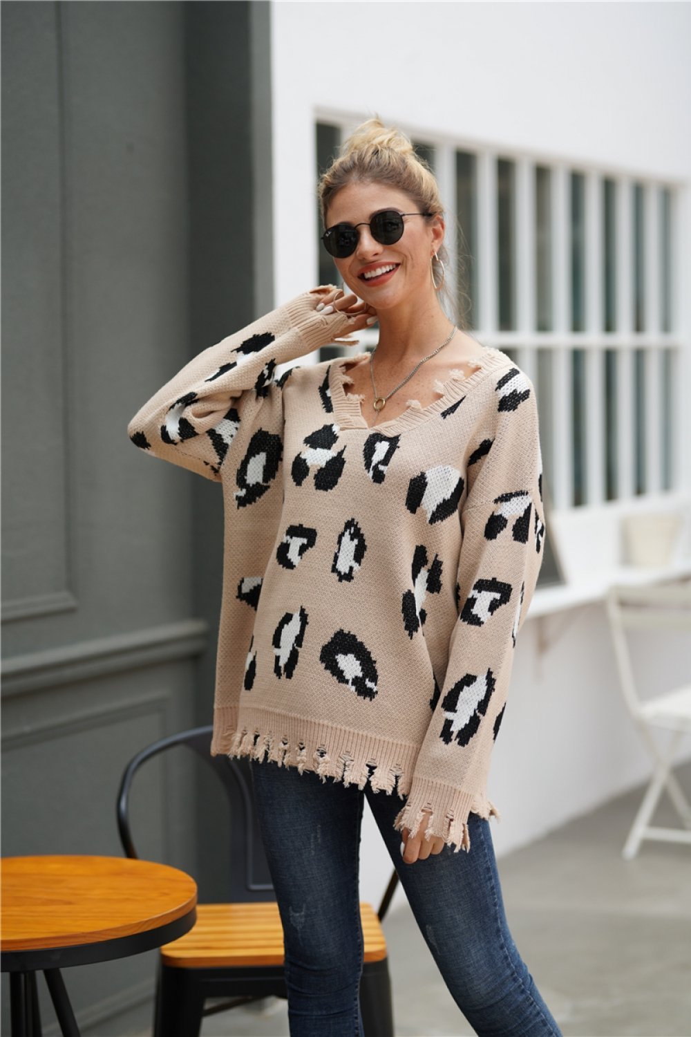 Jersey holgado de leopardo con dobladillo deshilachado para mujer