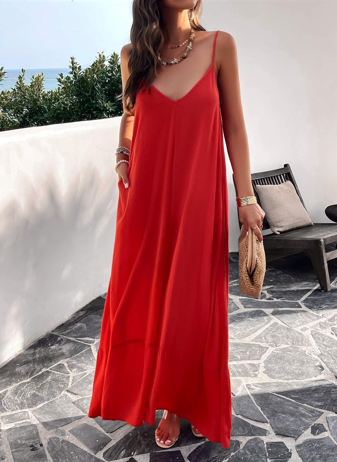 Vestido maxi fluido con bolsillos laterales