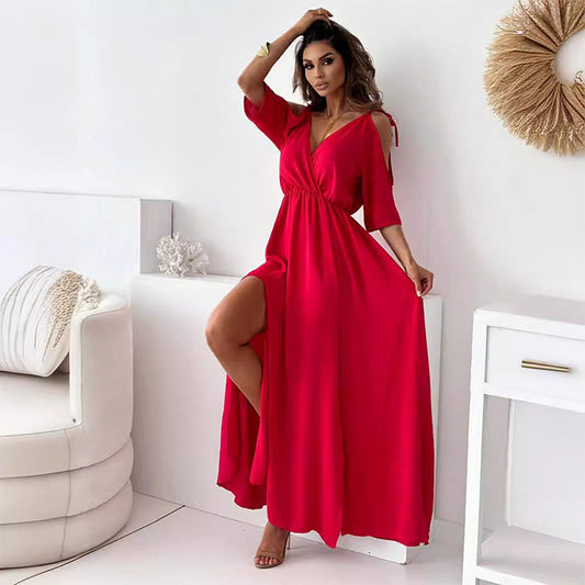 Elegante vestido largo con profundo escote en V y estilosas mangas tres cuartos