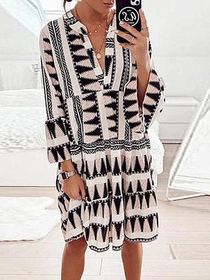 Vestido estampado con mangas largas y escote holgado en V