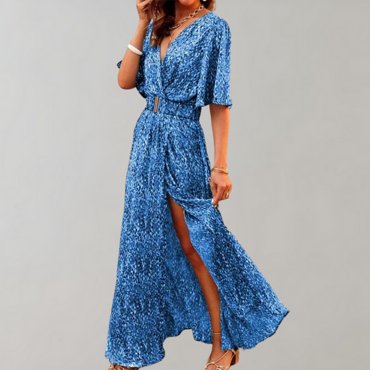 Vestido largo fluido con escote profundo y mangas anchas