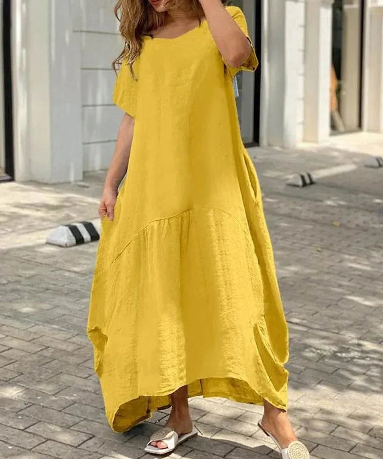maxi vestido acampanado de mujer con cuello en V y mangas cortas